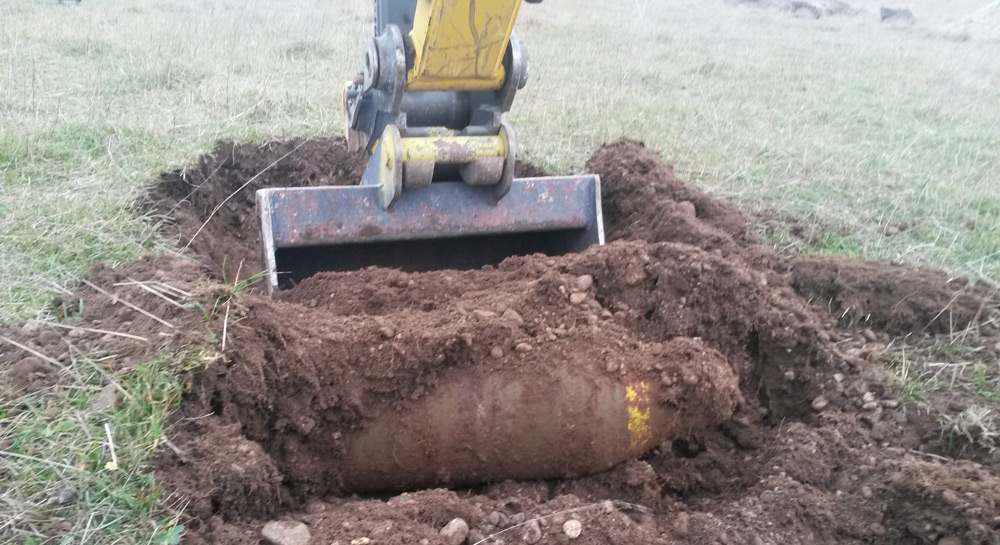 Excavation revealed a shallow buried bomb corresponding to the target location and depth in the GPR Line 2 data.