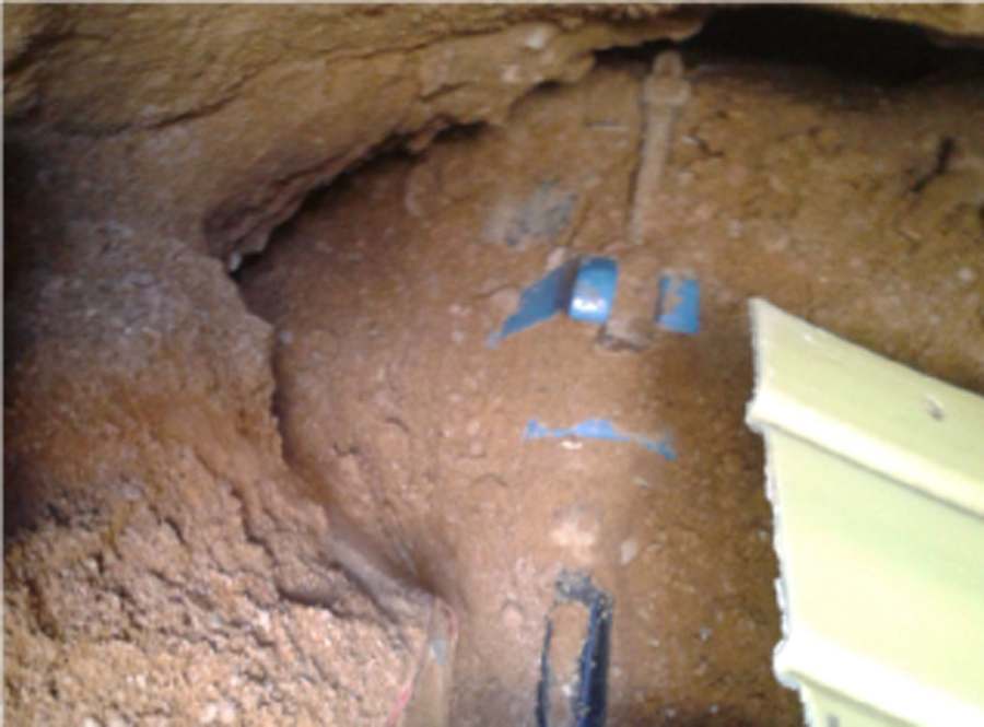 Tunnel showing the illegal connection tapping the water main. Tunnel showing the illegal connection tapping the water main.